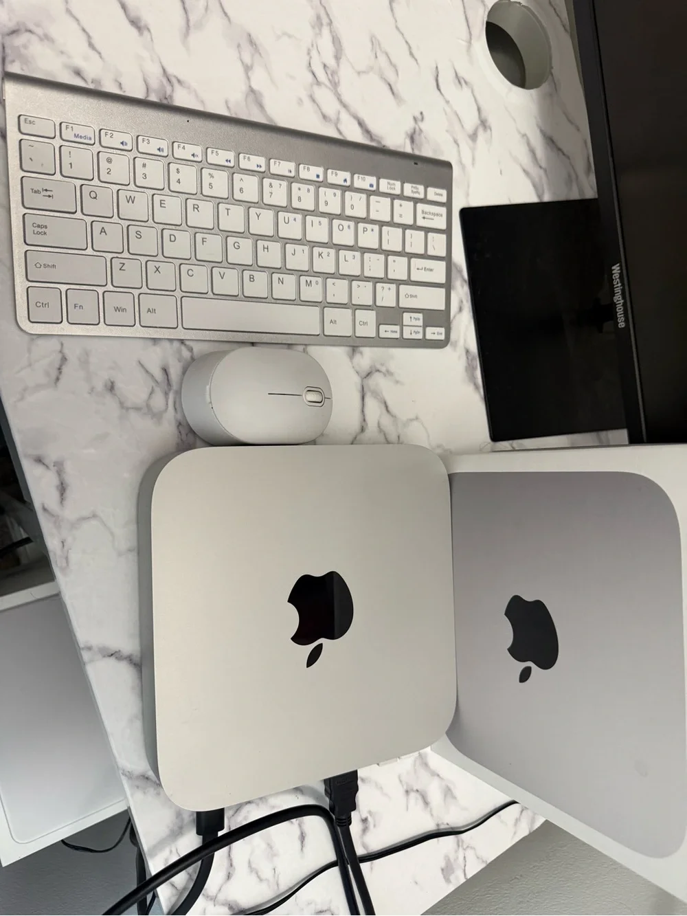Apple Mac mini with M2 Chip in White and Black Accents